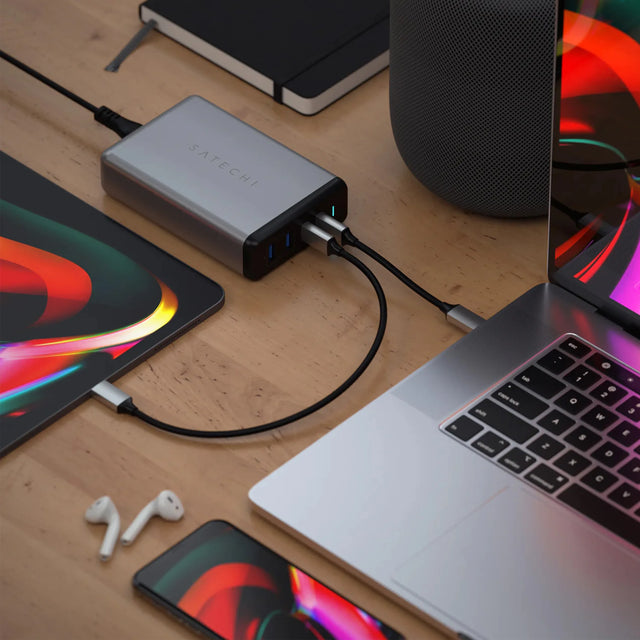 Satechi 108W Pro USB-C PD Desktop Charger charging MacBook and iPad on a wooden desk 