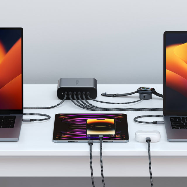 Satechi  200W USB-C 6-Port PD GaN Charger charging multiple devices at once, including MacBook, iPad, Apple Watch,  Laptop, iPhone, and AirPods.