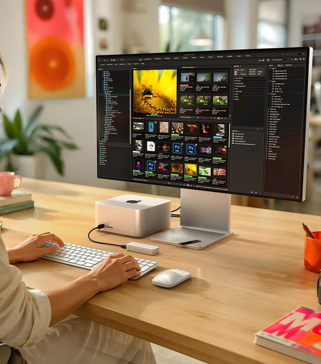 Satechi DotDisk™ 80Gbps SSD enclosure connected to a desktop workstation, providing ultra‑fast external NVMe storage for photo editing and high‑performance workflows.