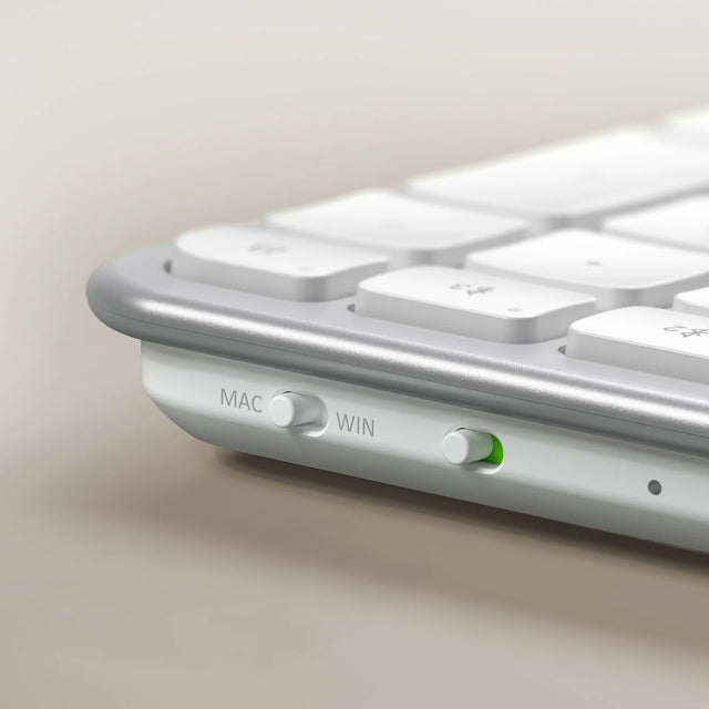 Close-up of the Slim EX3 Wireless Keyboard Mac and Win switch, to toggle between the two operating systems. 