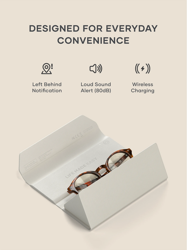 Eyeglasses in a Vegan-Leather FindAll™ Glasses Case with text 'Designed for Everyday Convenience' and icons on a beige background. Text on icons : Left Behind Notification, Loud Sound Alert (80dB) , Wireless Charging.
