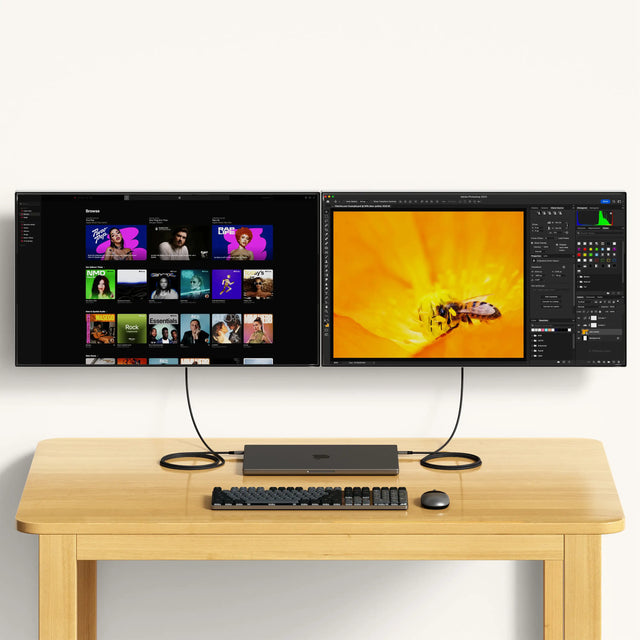 Satechi USB4 V2 Pro Cable connecting a desktop setup with two large external monitors, supporting high‑resolution displays and fast workflow performance.