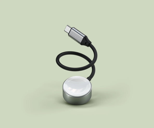 Satechi USB‑C Fast Charging Cable for Apple Watch shown coiled upright, featuring a braided USB‑C cable and compact magnetic charging puck.