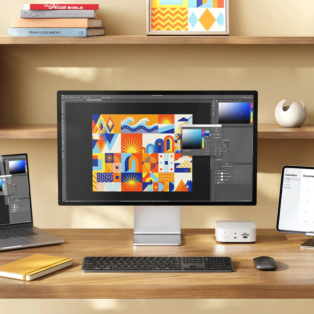 The Satechi Slim CEX3 Wireless Combo,  the Slim EX3 wireless keyboard and Slim EX wireless mouse positioned in front of a desktop computer.