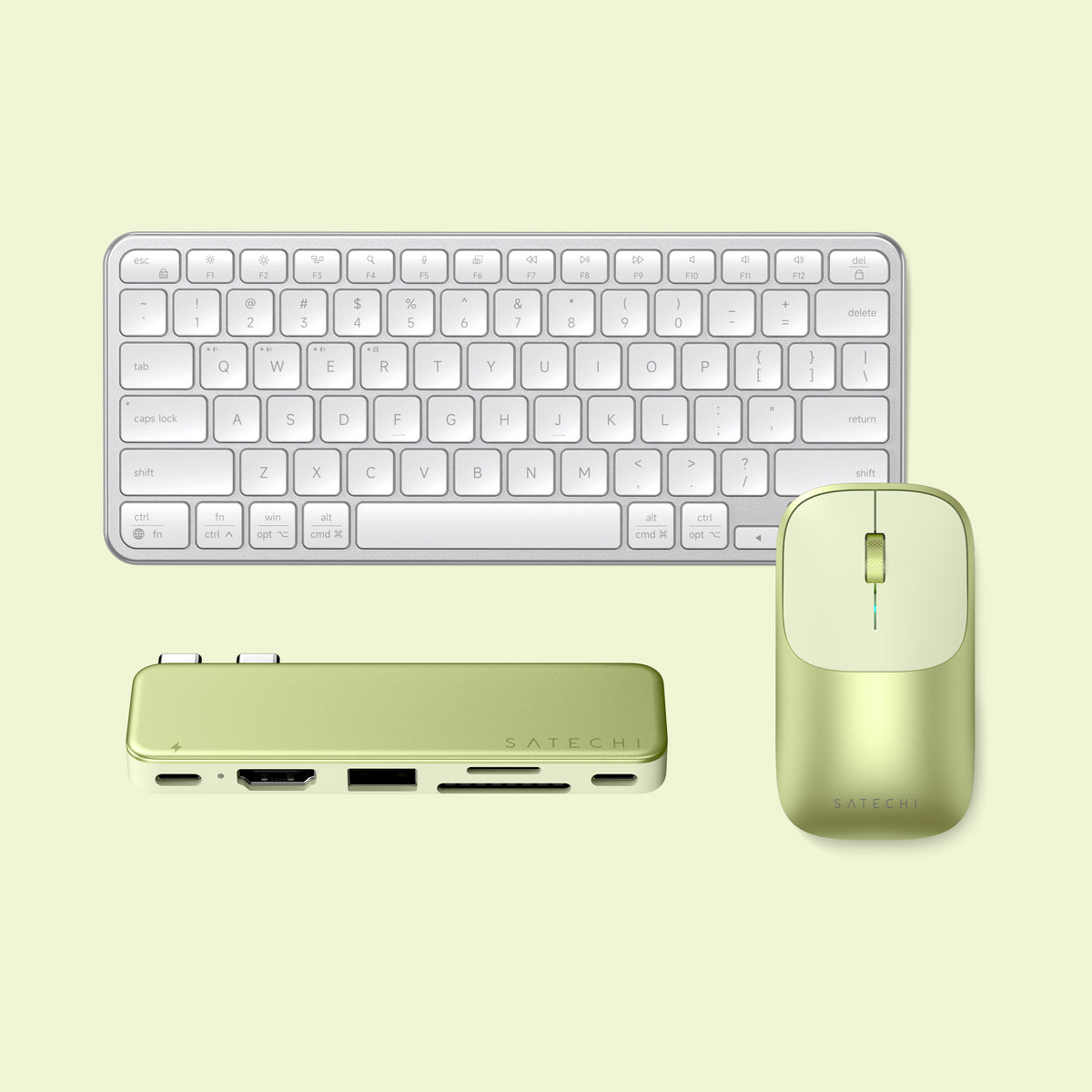 The Desk Setup back-to-school bundle: a silver Slim EX1 wireless keyboard for Mac, a citrus Slim EX wireless mouse, and a citrus USB-C Snap Hub for MacBook Neo, shown on a pale green background.