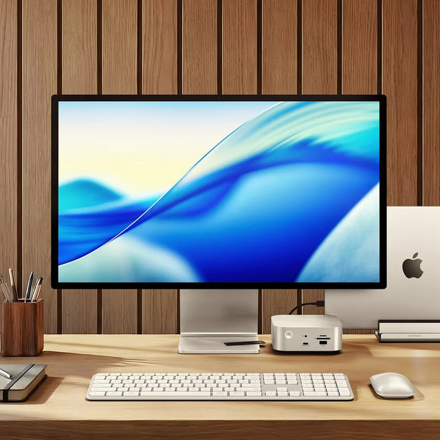 Modern office desk setup with a computer monitor, Thunderbolt 5 CubeDock™ with SSD Enclosure, Slim EX3 Wireless keyboard, and Slim EX Wireless Mouse on a wooden surface.