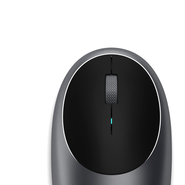 Close‑up top view of the M1 Wireless Mouse showing its smooth surface, central scroll wheel, and minimalist modern design.