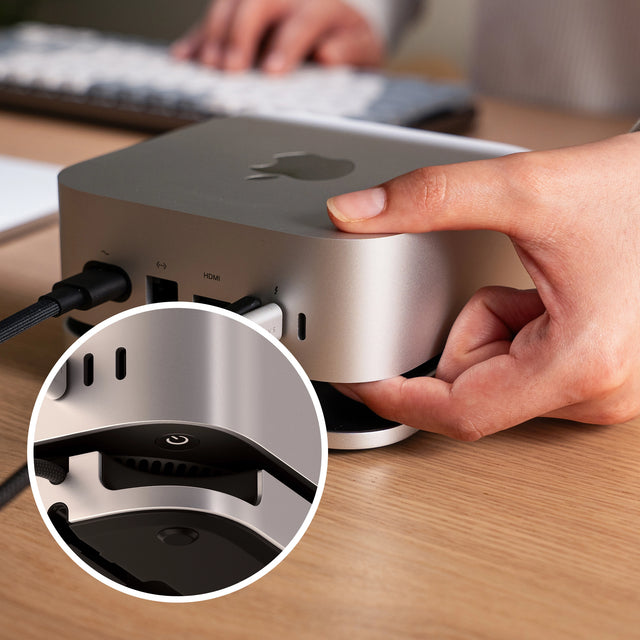 A person turning on the Satechi Mac Mini M4 Stand & Hub with SSD Enclosure, seamlessly accessing button with the special cutout placement for easy access. Next to image is a closure up of how the power button is accessed. 