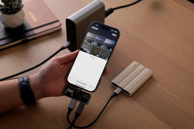 Satechi Mobile XR Hub with microSD Reader connected ton iPhone while the user demonstrates smooth file access and fast data transfer.