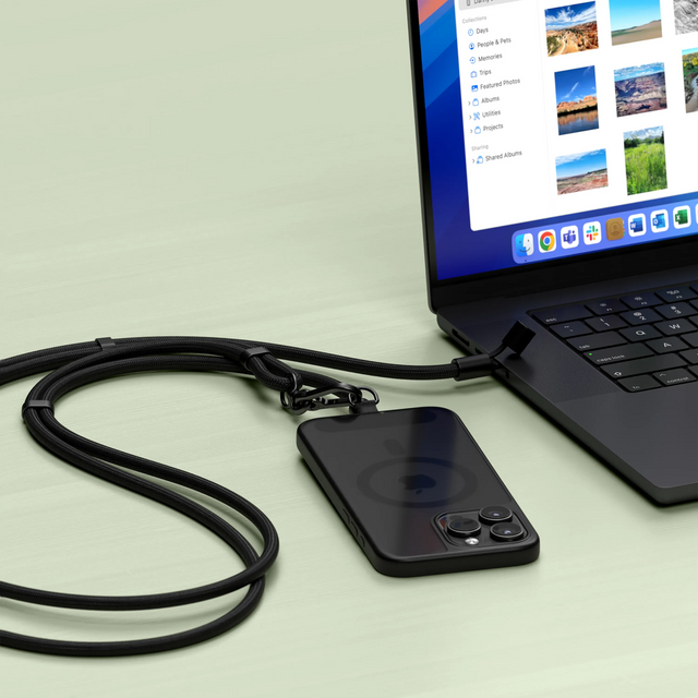Black iPhone connected and uploading files to a MacBook via a with OntheGo™ USB-C Lanyard Cable. 