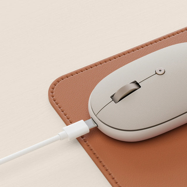 A USB-C cable connecting to the  OntheGo™ Bluetooth Mouse's USB-C port to charge. 