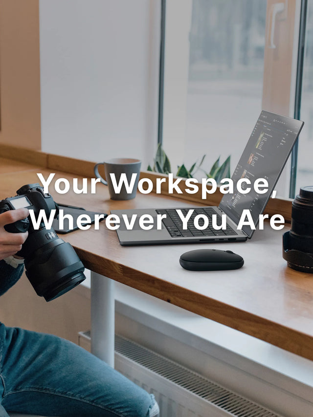 Person holding a camera next to a laptop and OntheGo™ Bluetooth Mouse on a desk with text 'Your Workspace, Wherever You Are'.