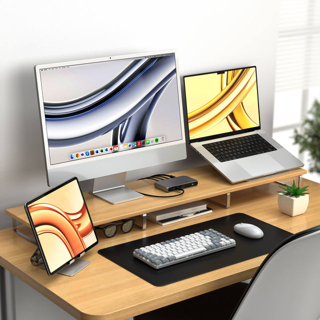 SM1 Slim Mechanical Backlit Bluetooth Keyboard on a minimalist desk setup with an iMac, MacBook, and iPad, showcasing its compact design and wireless multi‑device functionality.
