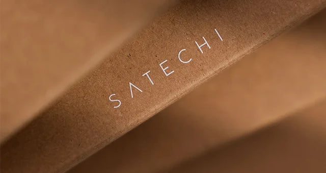 Minimalist recycled cardboard packaging featuring the Satechi logo, emphasizing sustainable materials and thoughtful product design.