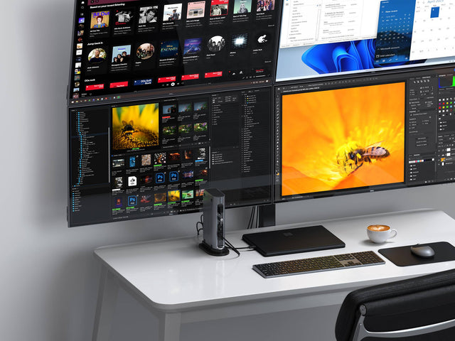 A Thunderbolt 4 Multimedia Pro Dock connected to a laptop and simultaneously displaying four external monitors.