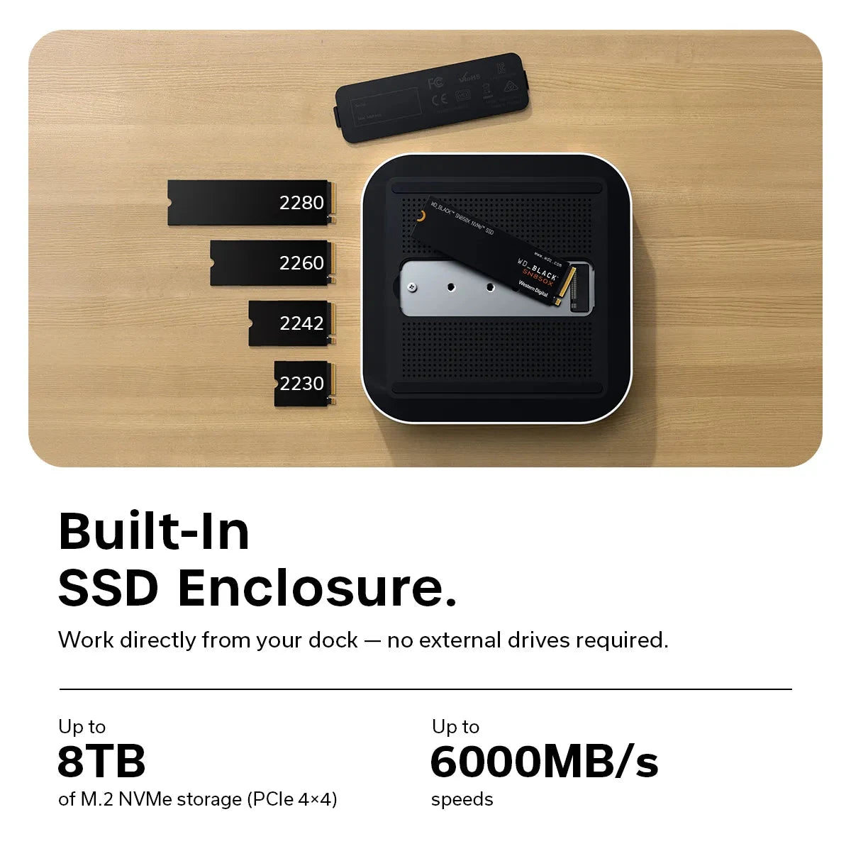 Top view of the Satechi Thunderbolt 5 CubeDock™ with its built-in SSD enclosure and multiple M.2 NVMe size options displayed on a desk. Sizes 2280, 2260, 2242, 2230. Text says: Built In SSD Enclosure. Works directly with your dock- no external drives required. Up to 8TB of M.2 NVMe Storage (PCle 4x4) and Up to 6000 MB/s speeds." 