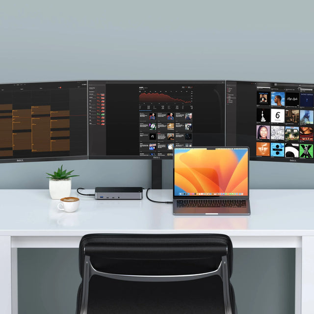 Triple 4K Display Docking Station connected to a MacBook on a clean desk setup, powering three ultra‑wide external monitors displaying productivity and media apps, highlighting multi‑screen workstation performance and connectivity.