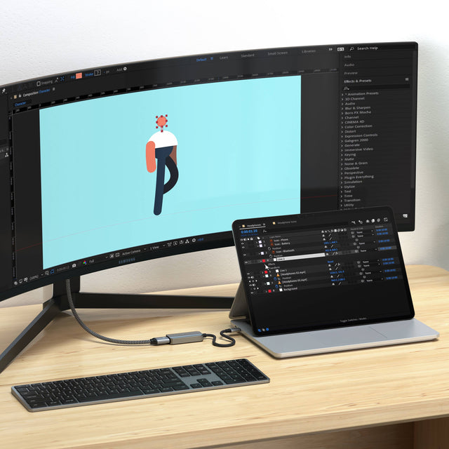 An iPad connected to an ultrawide monitor with the Satechi USB‑C to HDMI 2.1 8K Adapter, displaying a digital animation workspace on both screens.